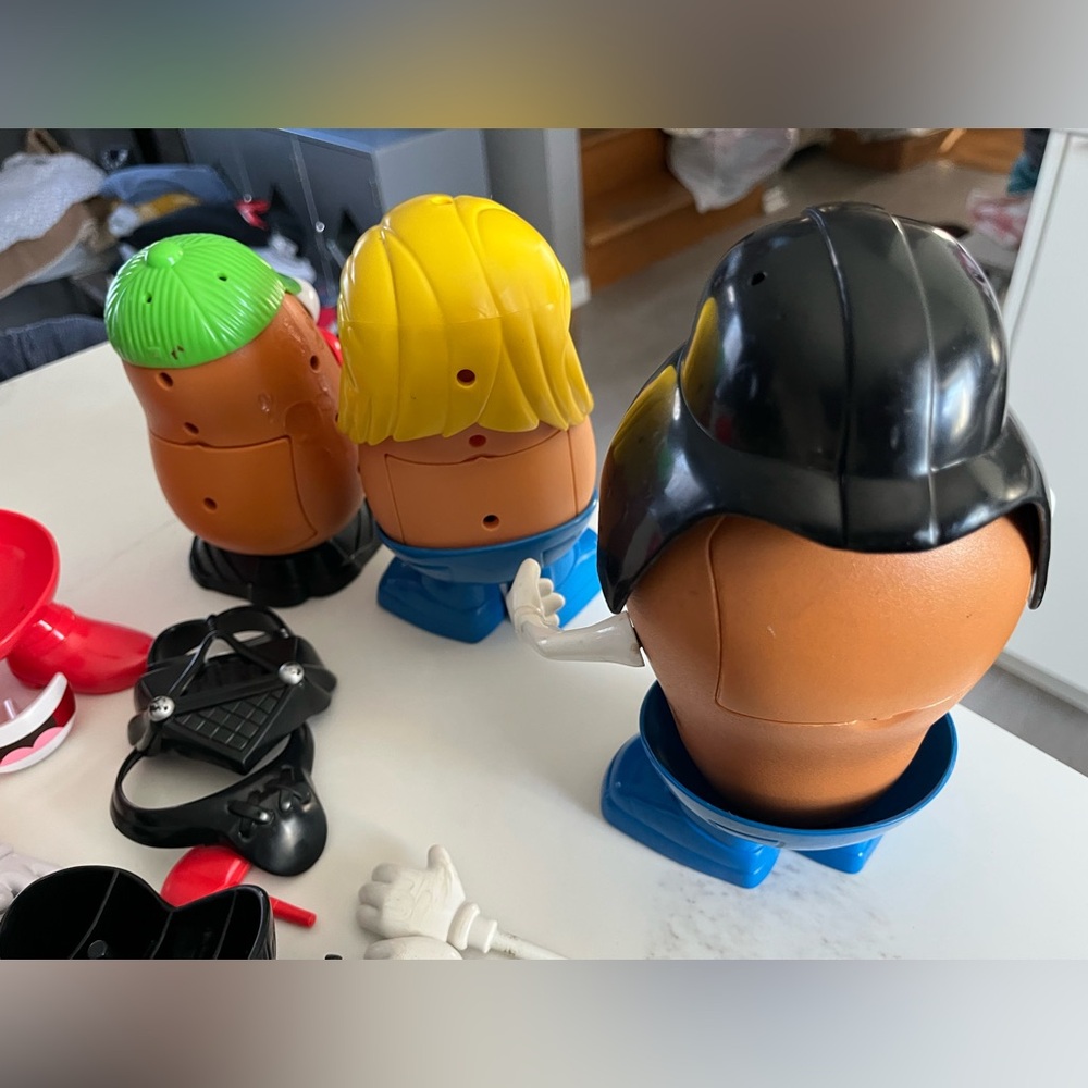 Mr potato head and accessories. Includes three potato heads. - Picture 4 of 5
